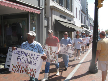Dozens of watermen and their families march in Annapolis. CNS Photo by Brady Holt.